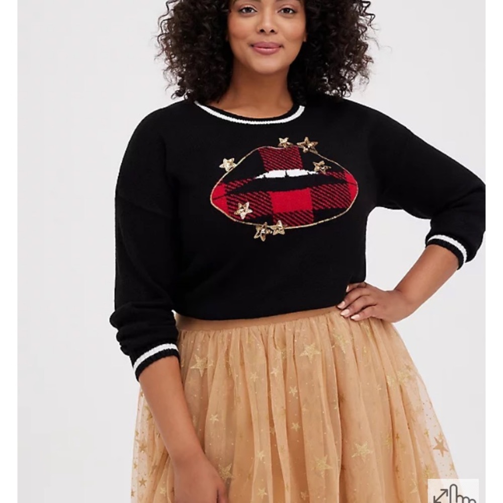 Black pull over sweater. Size 1 in plus size. Plaid red lips with gold star.